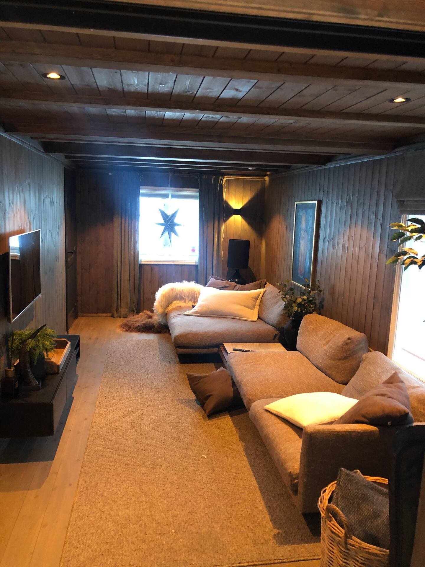 Downstairs TV room with comfortable seating